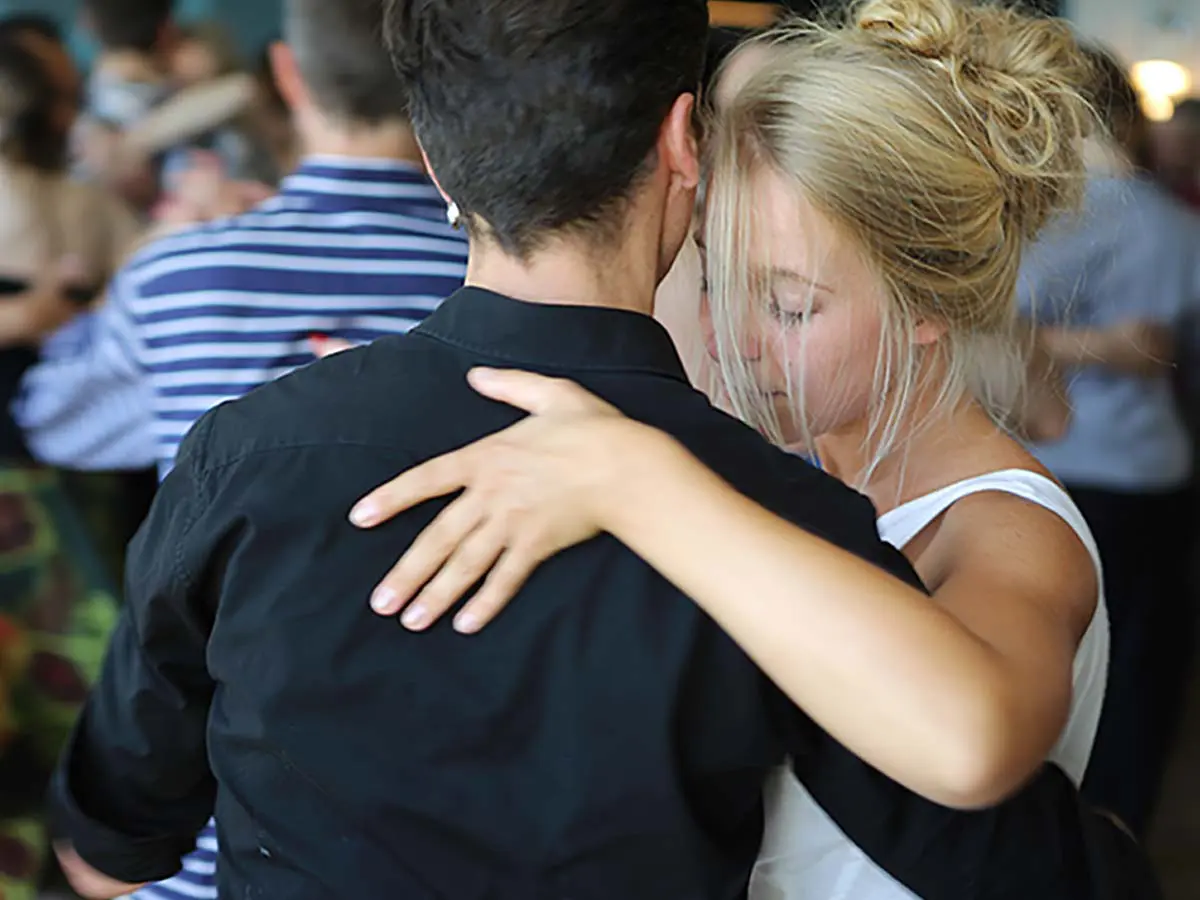 Young couple learning tango dance